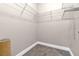 Bright walk-in closet featuring carpeted floor and coated-wire shelving at 2230 Cheshire Bridge Rd # 412, Atlanta, GA 30324