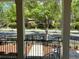 Charming covered front porch with white columns overlooks the landscaped yard at 1059 Dryden Ln # 11, Atlanta, GA 30319