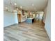 Bright open-concept living space featuring modern kitchen, dining area, and wood floors at 1059 Dryden Ln # 11, Atlanta, GA 30319