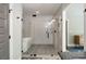 Bathroom with glass shower enclosure, soaking tub, and modern fixtures at 1535 Deerwood Dr, Decatur, GA 30030