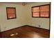 Bedroom with natural light and hardwood flooring at 1646 Hurt Sw Rd, Marietta, GA 30008