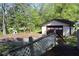 View of detached two car garage from back deck at 1646 Hurt Sw Rd, Marietta, GA 30008