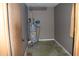 Utility room featuring a water heater at 1646 Hurt Sw Rd, Marietta, GA 30008