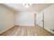 Bright bedroom features stylish floors, closet space, and is freshly painted at 3719 Paul St, Douglasville, GA 30135
