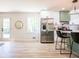 Bright, updated kitchen featuring stainless steel appliances and modern finishes at 3719 Paul St, Douglasville, GA 30135