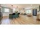 Open-concept living area with kitchen island and modern furnishings at 3719 Paul St, Douglasville, GA 30135