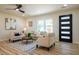 Comfortable living room features modern furniture, stylish rug, and contemporary decor at 3719 Paul St, Douglasville, GA 30135