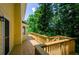 Spacious wooden deck overlooking a lush backyard, perfect for outdoor entertaining and relaxation at 4503 Rivercliff Sw Dr, Lilburn, GA 30047