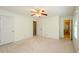 Bedroom with carpet and white doors at 4503 Rivercliff Sw Dr, Lilburn, GA 30047