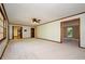 Spacious living room featuring trim accents and multiple entryways to other parts of the home at 4503 Rivercliff Sw Dr, Lilburn, GA 30047