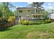 Spacious backyard with an above-ground pool and a wooden deck at 5539 Hurstcliffe Nw Dr, Kennesaw, GA 30152