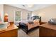 Comfortable bedroom featuring a full-sized bed and natural light at 5539 Hurstcliffe Nw Dr, Kennesaw, GA 30152