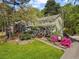 Attractive home boasting a welcoming entrance, a well-manicured lawn, and colorful azaleas at 5539 Hurstcliffe Nw Dr, Kennesaw, GA 30152