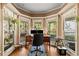 Bright home office featuring multiple windows with tree views, creating a productive workspace at 5539 Hurstcliffe Nw Dr, Kennesaw, GA 30152