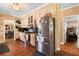 Kitchen with stainless steel refrigerator and hardwood floors at 5539 Hurstcliffe Nw Dr, Kennesaw, GA 30152