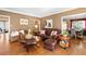 Spacious living room with hardwood floors and comfortable seating, perfect for relaxing and entertaining guests at 5539 Hurstcliffe Nw Dr, Kennesaw, GA 30152