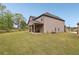 Lovely home with an expansive backyard with a covered patio perfect for entertaining at 811 Holly Mist Ct, Loganville, GA 30052