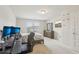 Bright bedroom with a plush carpet, modern light fixture, and a comfortable bed at 811 Holly Mist Ct, Loganville, GA 30052