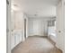 Bright main bathroom with tiled floors, walk-in shower, and double vanity at 811 Holly Mist Ct, Loganville, GA 30052