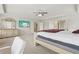 Spacious main bedroom boasts a tray ceiling, plush carpet, and neutral paint tones at 811 Holly Mist Ct, Loganville, GA 30052
