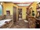 Well-appointed bathroom with tiled flooring, makeup vanity, and soaking tub at 2740 Drayton Hall Dr, Buford, GA 30519