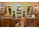 Well-appointed bathroom with dual sink vanities, vanity table, and wallpaper at 2740 Drayton Hall Dr, Buford, GA 30519