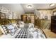 Charming bedroom showcasing two twin beds with black and white bedding, and decorative wallpaper at 2740 Drayton Hall Dr, Buford, GA 30519