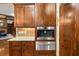 Custom kitchen with stainless steel appliances, granite counters and custom wood cabinetry at 2740 Drayton Hall Dr, Buford, GA 30519