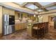 Well-equipped kitchen featuring stainless steel appliances, a stone countertop island, and custom cabinetry at 2740 Drayton Hall Dr, Buford, GA 30519