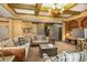 Inviting living room with coffered ceilings, barn doors, comfortable seating and decorative accents at 2740 Drayton Hall Dr, Buford, GA 30519