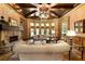 Inviting living room with stone fireplace, large bay window, and a cozy seating area at 2740 Drayton Hall Dr, Buford, GA 30519