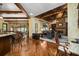 Open concept floor plan featuring kitchen, dining area, and living space with stone fireplace at 2740 Drayton Hall Dr, Buford, GA 30519