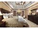 Spacious main bedroom with tray ceilings, fireplace, and traditional furnishings at 2740 Drayton Hall Dr, Buford, GA 30519