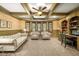 Relaxing sitting room with custom built-ins, natural light, and comfortable seating at 2740 Drayton Hall Dr, Buford, GA 30519