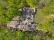 Aerial view of home with mature trees at 3444 Wood Acres Blvd, Duluth, GA 30096