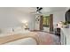 Well-lit bedroom features a built-in bookcase, work space and natural light at 3444 Wood Acres Blvd, Duluth, GA 30096