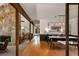 Stone fireplace visible from the dining room in open-concept living space at 3444 Wood Acres Blvd, Duluth, GA 30096