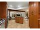 Open kitchen showcasing stainless steel appliances, a center island, and seamless living area access at 3444 Wood Acres Blvd, Duluth, GA 30096