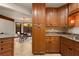 Well-equipped kitchen with granite countertops, custom cabinets, and adjacent breakfast area at 3444 Wood Acres Blvd, Duluth, GA 30096