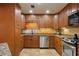 Updated kitchen featuring stainless steel appliances, granite countertops and custom cabinetry at 3444 Wood Acres Blvd, Duluth, GA 30096