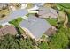Aerial view of a home in a cul-de-sac, featuring a backyard with pergola, and a lush lawn at 4580 Orchard Ridge Ct, Cumming, GA 30028