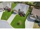 An aerial view of a well-maintained home with a lush green lawn at 4580 Orchard Ridge Ct, Cumming, GA 30028