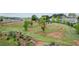 Large backyard featuring trees and landscaping, great for outdoor activities at 4580 Orchard Ridge Ct, Cumming, GA 30028