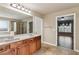 Bright bathroom boasts double vanity, granite counters, and a separate shower at 4580 Orchard Ridge Ct, Cumming, GA 30028