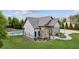 Community clubhouse featuring stone accents and a pool with ample parking at 4580 Orchard Ridge Ct, Cumming, GA 30028
