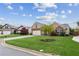 Well-maintained home with a lush green lawn and beautiful landscaping at 4580 Orchard Ridge Ct, Cumming, GA 30028