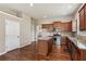 Spacious eat-in kitchen featuring stainless steel appliances, granite countertops, and an island at 4580 Orchard Ridge Ct, Cumming, GA 30028