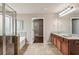 Large main bath with walk-in shower, soaking tub and double sink vanity at 4580 Orchard Ridge Ct, Cumming, GA 30028