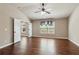 Bright main bedroom suite featuring high ceilings, ceiling fan and doorway to additional room at 4580 Orchard Ridge Ct, Cumming, GA 30028