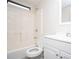 Bathroom featuring a tub with a shower and a modern vanity and sink at 56 Windom Dr, Carrollton, GA 30116